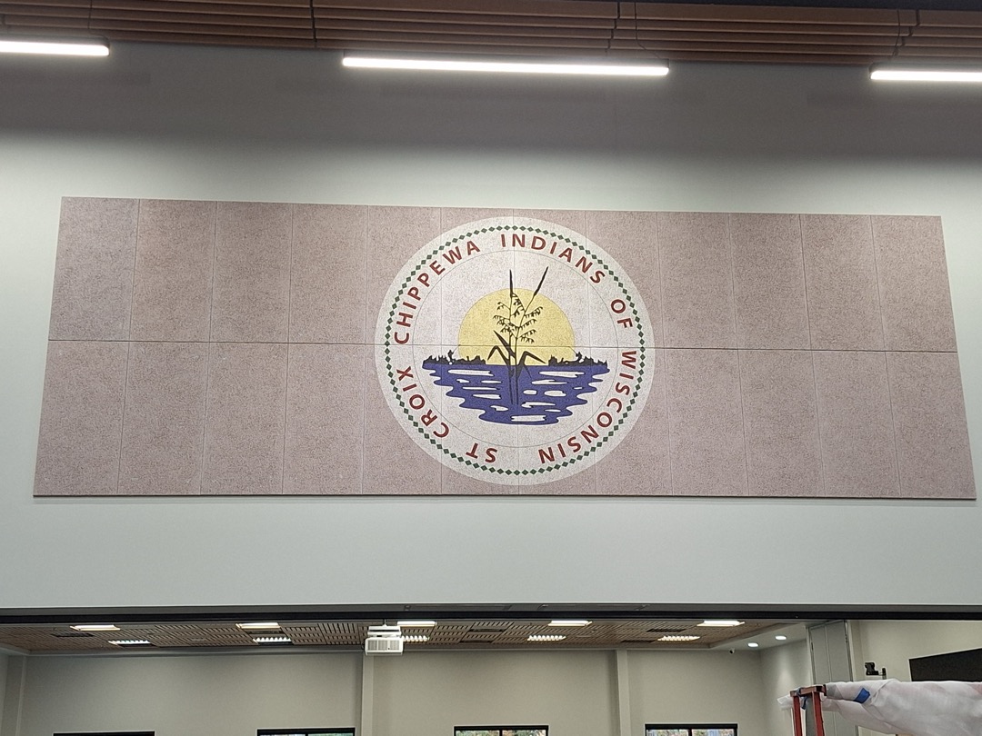 Fabric wrapped wall panels with custom printed seal design