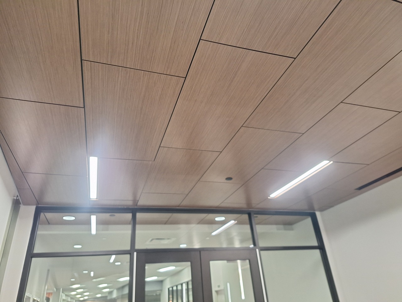 Metal linear ceiling installation by Hall Ceilings